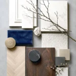 Material palette ของ The Eclectic Sanctuary ที่รวบรวมหินอ่อน ไม้ หนัง โลหะ และพื้นผิวโทนเข้ม